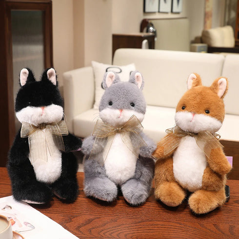 Hase Kuscheltier mit Schleife