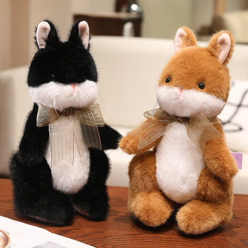 Hase Kuscheltier mit Schleife