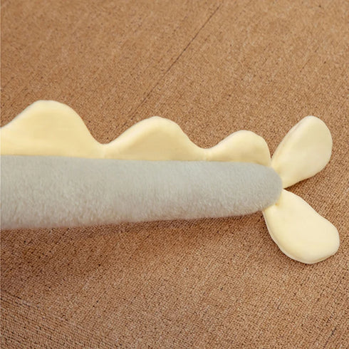 Liegender Dinosaurier Kuscheltier