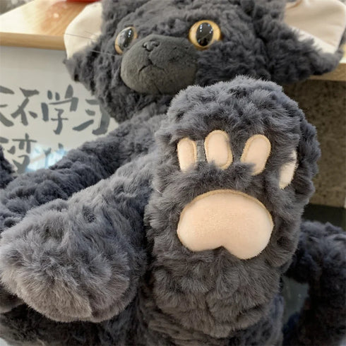 Schwarzes Katze Kuscheltier